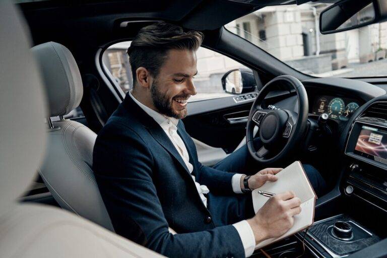 Chauffeur taking the notes of daily or hourly travel